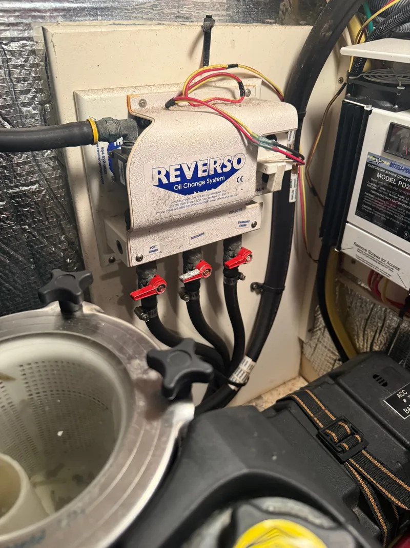 Slide: The Image of Reverso oil change system in a 2006 Cruisers Yachts 420 Express. - 20
