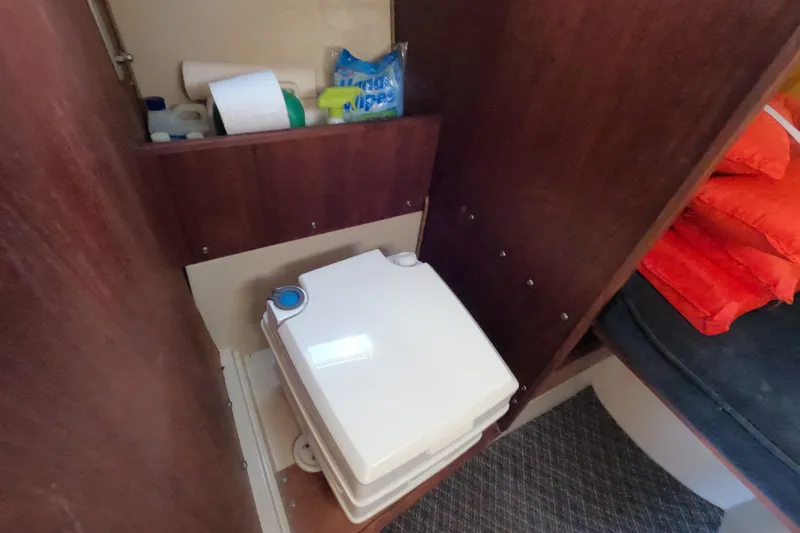 Slide: The Image of Compact marine toilet in 1983 Catalina 25 sailboat cabin. - 13