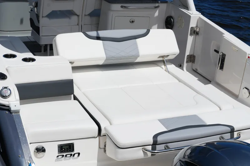 Slide: The Image of 2022 Chaparral 280 OSX boat interior with luxurious seating and modern design. - 39