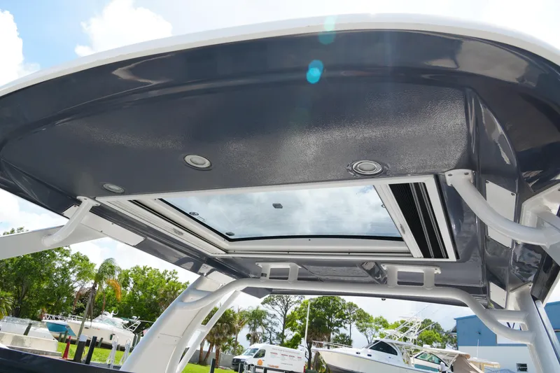 Slide: The Image of 2022 Chaparral 280 OSX boat roof with skylight and sleek design. - 53