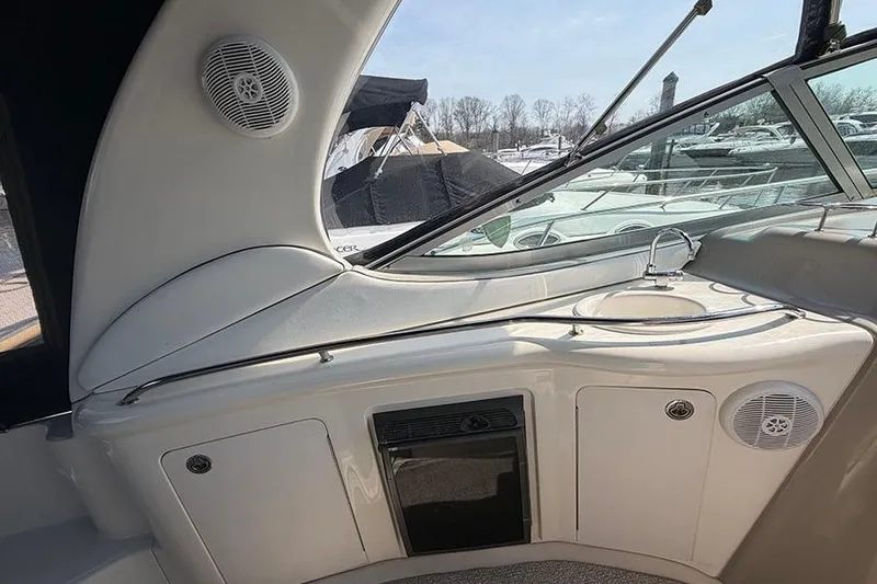 Slide: The Image of Interior view of 2007 Sea Ray 300 Sundancer boat with sink and speaker. - 10