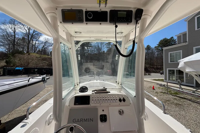 Slide: The Image of Interior view of 2011 Everglades 230 Center Console boat with Garmin navigation system. - 21