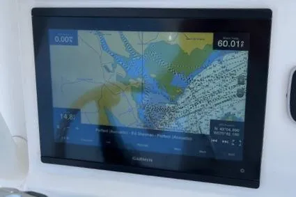 Slide: The Image of Garmin navigation display on 2011 Everglades 230 Center Console boat. - 23