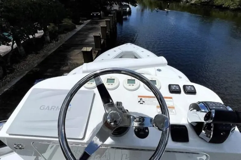 Slide: The Image of Helm of 2022 SeaVee 390Z boat with Garmin navigation system. - 3