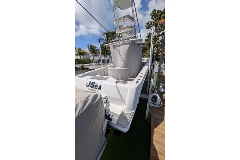 Slide: The Image of 2022 SeaVee 390Z boat docked in Palm Beach, Florida, under a clear sky. - 7