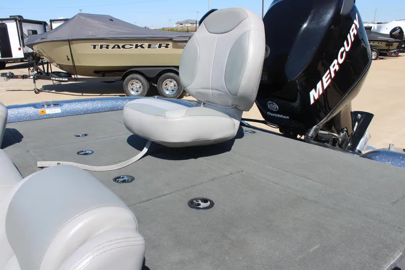 Slide: The Image of 2006 Stratos 275 Pro XL boat with Mercury engine and Tracker boat in background. - 10