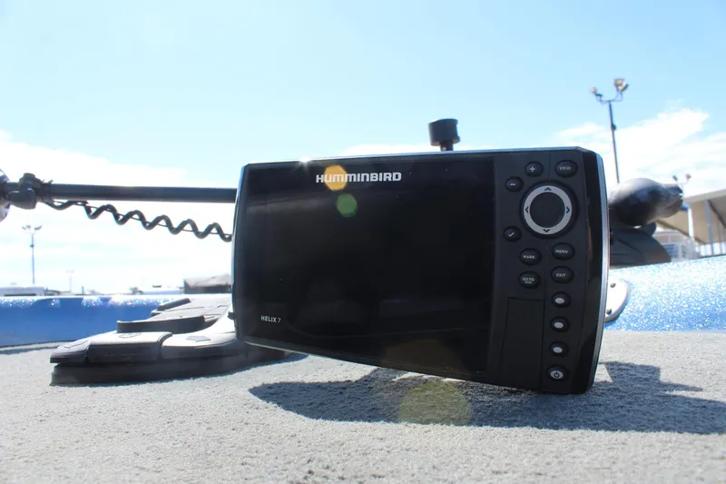 Slide: The Image of Humminbird Helix 7 fish finder on 2006 Stratos 275 Pro XL boat deck. - 14