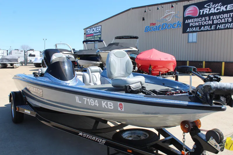 Slide: The Image of 2006 Stratos 275 Pro XL boat on trailer at dealership lot. - 2