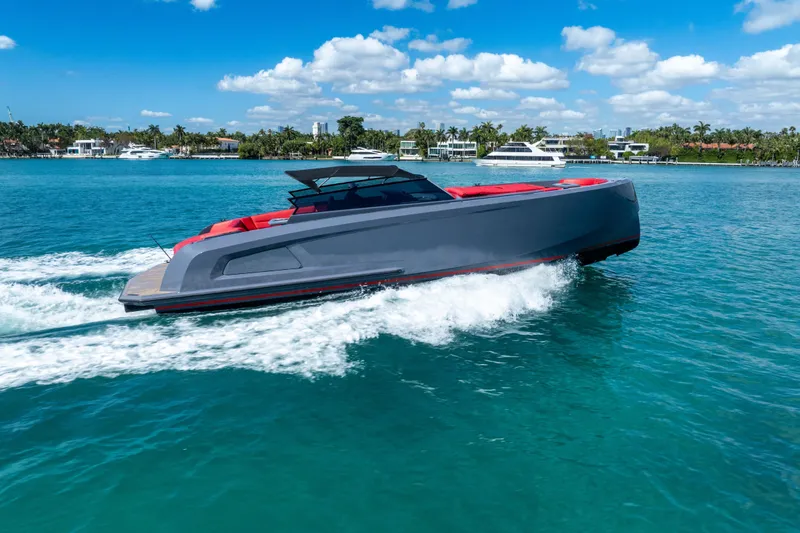 The Image of 2021 Vanquish Yachts 45 cruising on clear blue water under a sunny sky. - 0