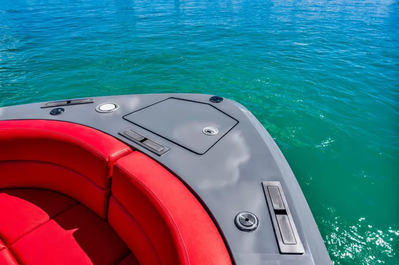 Slide: The Image of Luxurious Vanquish Yachts 45 with red seating, 2021 model, on turquoise water. - 19