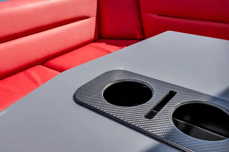 Slide: The Image of Red seating and cup holders on 2021 Vanquish Yachts 45 boat. - 22