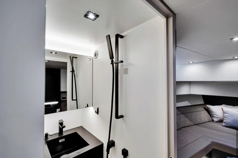 Slide: The Image of Modern bathroom interior on 2021 Vanquish Yachts 45, featuring sleek design and luxury finishes. - 39