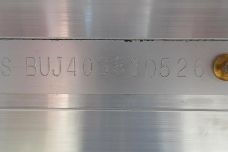 Slide: The Image of Hull identification number on a 2026 Sun Tracker SportFish 22 DLX boat. - 13