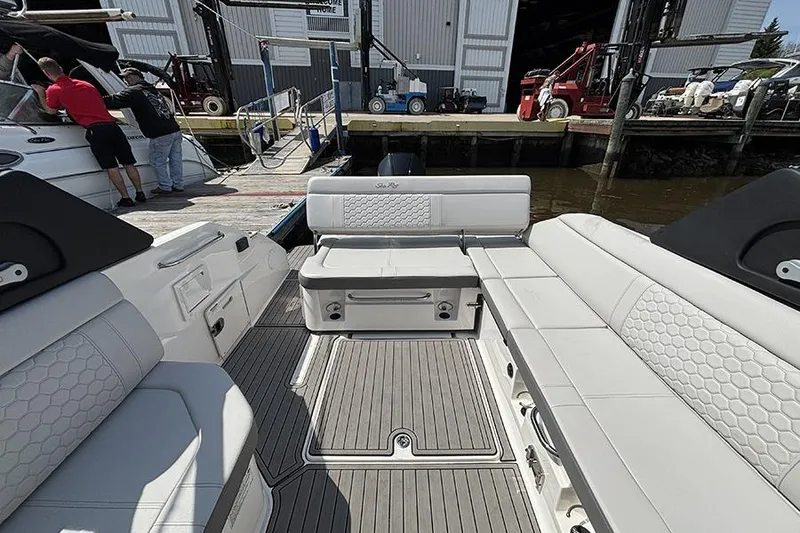 Slide: The Image of 2024 Sea Ray SDX 250 Outboard boat interior with spacious seating and modern design. - 7