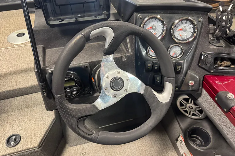 Slide: The Image of Steering wheel and dashboard of 2022 Tracker Targa V-18 WT boat. - 7