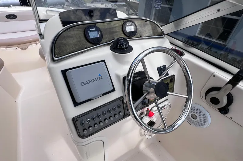 Slide: The Image of Steering console of 2008 Scout 222 Dorado boat with Garmin navigation system. - 27