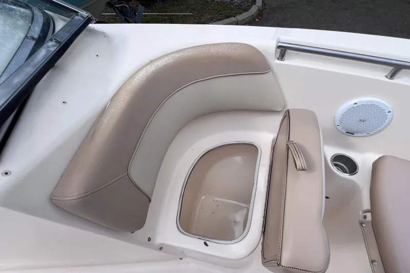 Slide: The Image of 2008 Scout 222 Dorado boat interior with beige seating and speaker. - 36