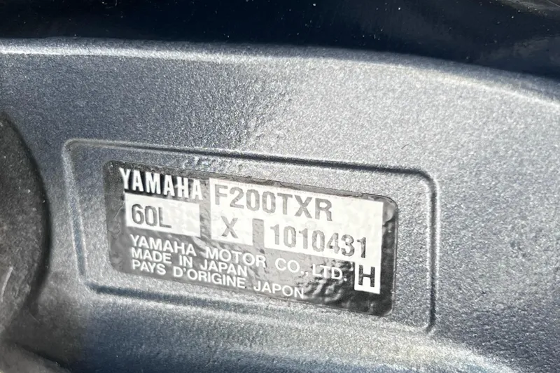 Slide: The Image of Yamaha F200TXR engine label on 2008 Scout 222 Dorado boat, made in Japan. - 45