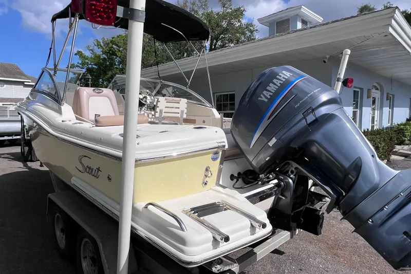 Slide: The Image of 2008 Scout 222 Dorado boat with Yamaha outboard motor on a trailer. - 6