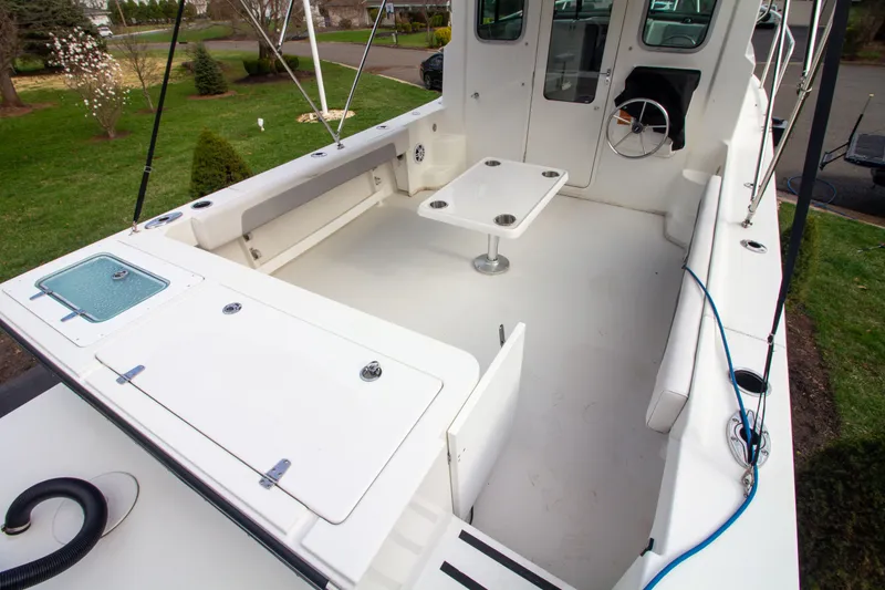 Slide: The Image of Interior of Parker 2520 XLD Sport Cabin boat, year 2022. - 11