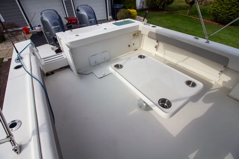 Slide: The Image of Parker 2520 XLD Sport Cabin 2022 with spacious deck and twin engines. - 13