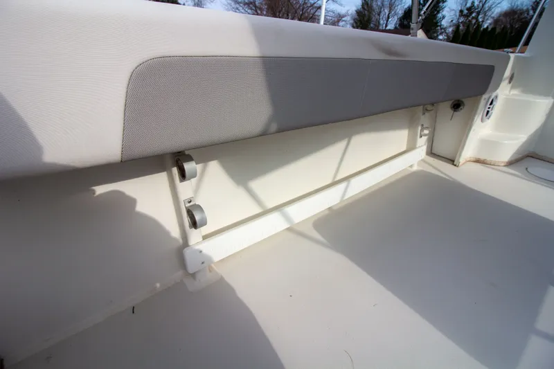 Slide: The Image of Interior of 2022 Parker 2520 XLD Sport Cabin with gray seat cushion. - 15