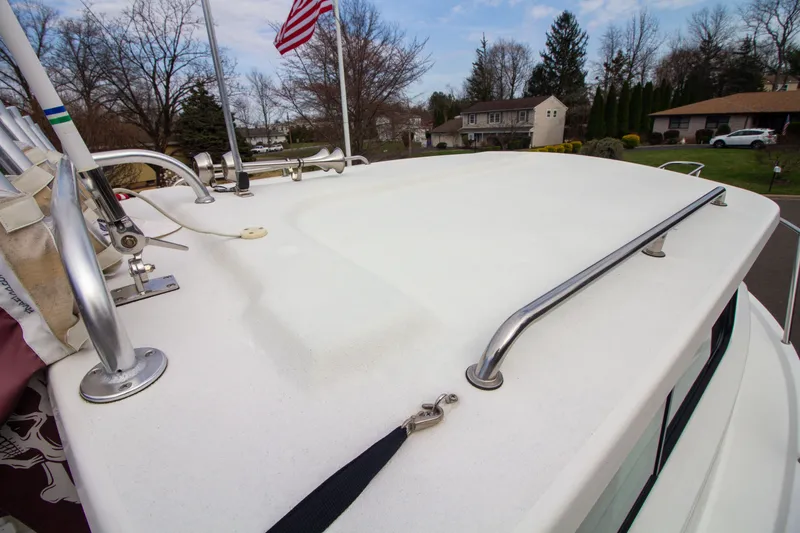 Slide: The Image of Roof of 2022 Parker 2520 XLD Sport Cabin with flag. - 19