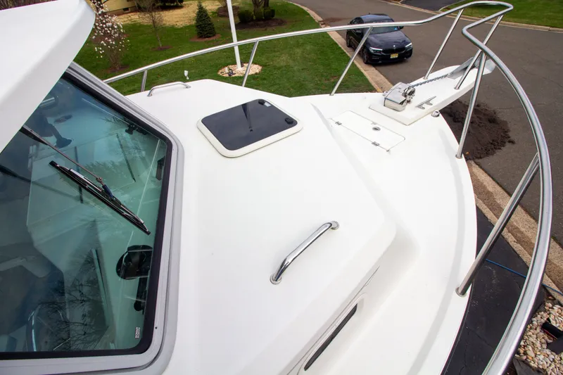 Slide: The Image of Parker 2520 XLD Sport Cabin 2022 on trailer, front deck view. - 21