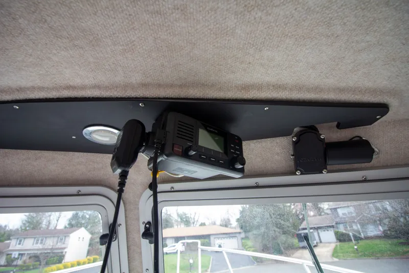 Slide: The Image of Interior of 2022 Parker 2520 XLD Sport Cabin with radio equipment. - 31