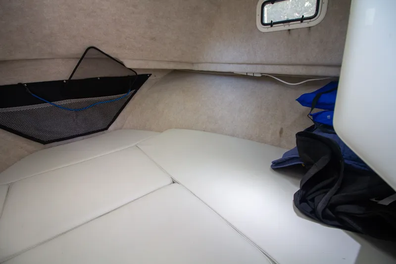 Slide: The Image of Interior of 2022 Parker 2520 XLD Sport Cabin with storage area. - 33