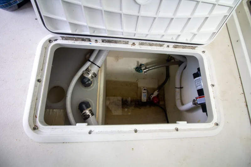 Slide: The Image of Interior view of Parker 2520 XLD Sport Cabin 2022 boat engine compartment. - 39