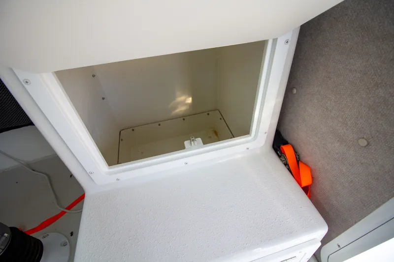 Slide: The Image of Interior of 2022 Parker 2520 XLD Sport Cabin with storage compartment. - 41