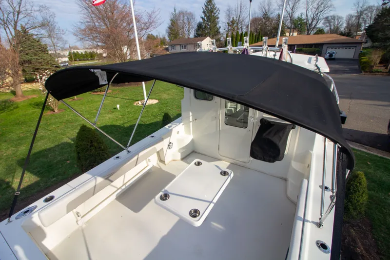 Slide: The Image of 2022 Parker 2520 XLD Sport Cabin with black sunshade outdoors. - 45