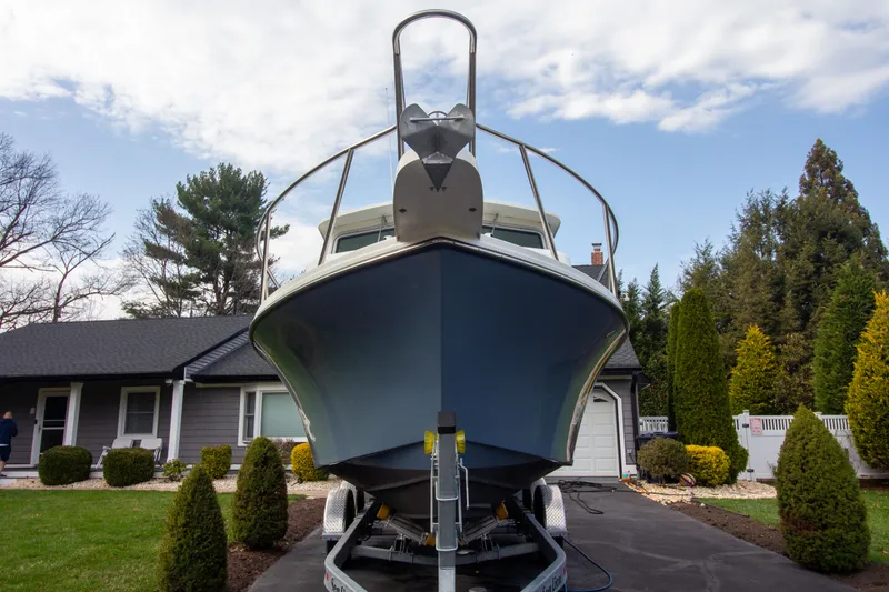 Slide: The Image of Parker 2520 XLD Sport Cabin 2022 on trailer in front of house. - 7