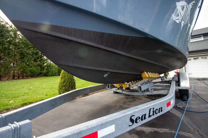 Slide: The Image of Parker 2520 XLD Sport Cabin 2022 on trailer outdoors. - 8