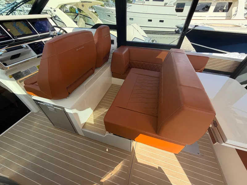 Slide: The Image of Interior of the Saxdor 400 GTC with brown leather seating and modern features. - 15