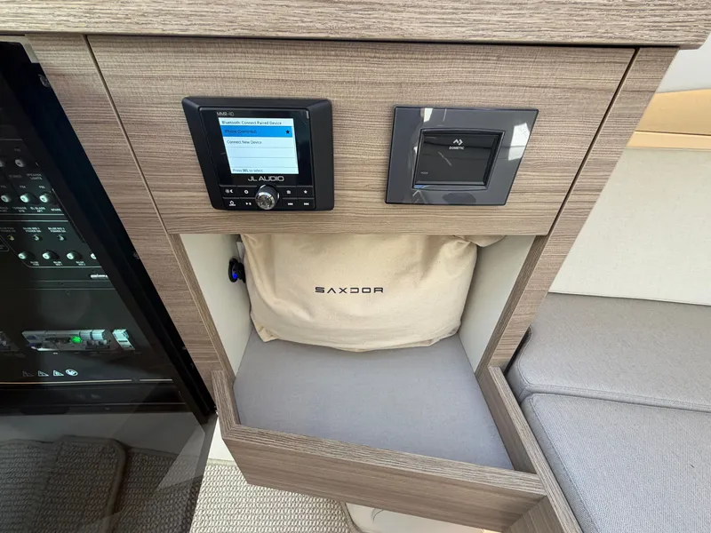 Slide: The Image of Interior of the Saxdor 400 GTC featuring modern controls and stylish wood design. - 39