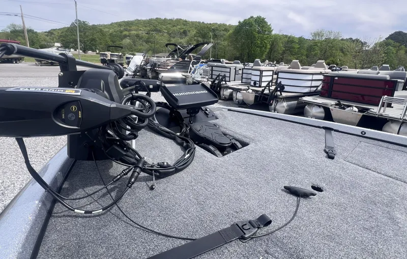 Slide: The Image of 2024 Falcon F205 boat with advanced electronics and gray deck. - 10