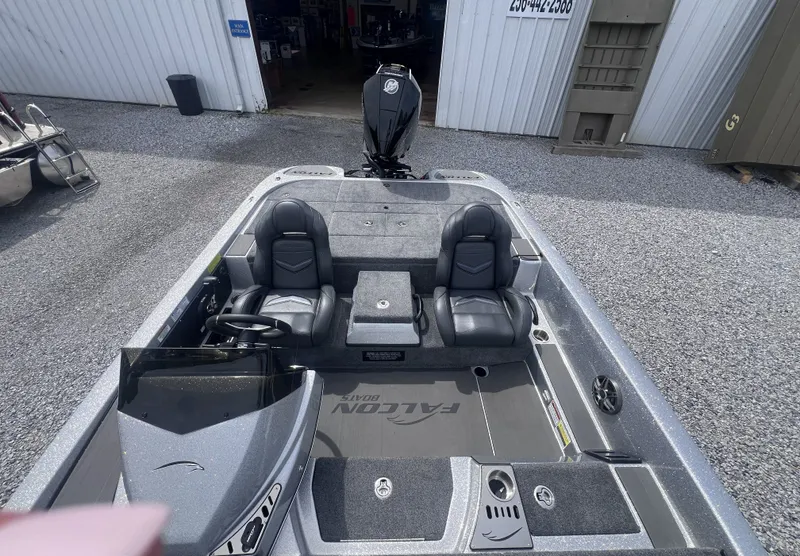 Slide: The Image of 2024 Falcon F205 boat with dual seats and steering console. - 14