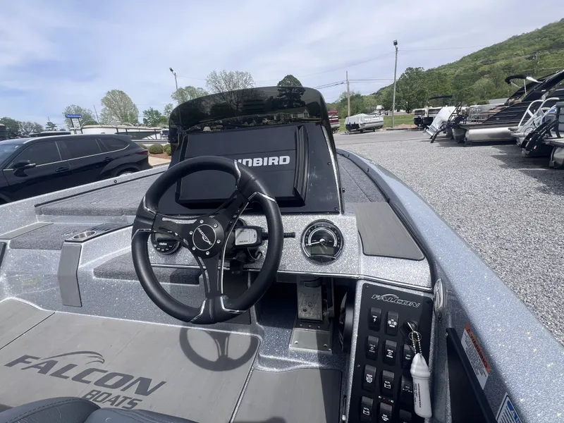 Slide: The Image of Interior view of 2024 Falcon F205 boat with modern steering console. - 4