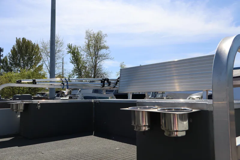 Slide: The Image of 2020 Ag Dryer Laker Pontoon with aluminum seating and cup holders, under a clear blue sky. - 4