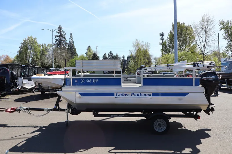 Slide: The Image of 2020 Ag Dryer Laker Pontoon boat on trailer, parked outdoors. - 7