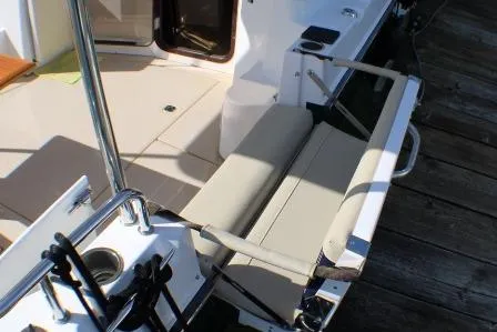 Slide: The Image of 2019 Ranger Tugs R-31 CB boat deck with seating and railing. - 22