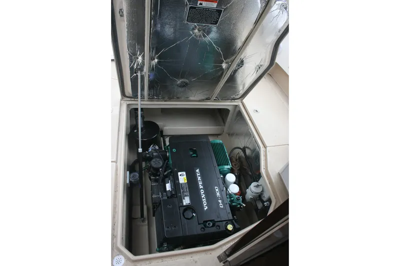 Slide: The Image of Engine compartment of 2019 Ranger Tugs R-31 CB with Volvo Penta D4-300 engine. - 27