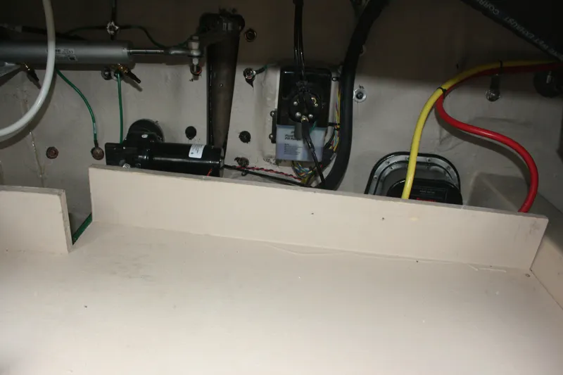 Slide: The Image of Engine compartment of 2019 Ranger Tugs R-31 CB with wiring and mechanical components. - 36