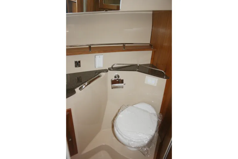 Slide: The Image of 2019 Ranger Tugs R-31 CB boat bathroom with modern fixtures and compact design. - 67