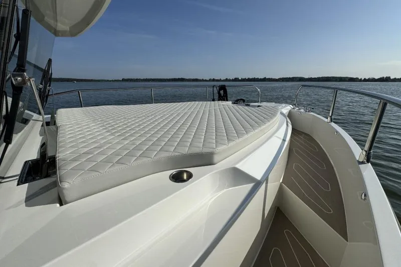 Slide: The Image of 2026 Cobra Yachts Campione 41 Coupe with luxurious deck and scenic water view. - 10
