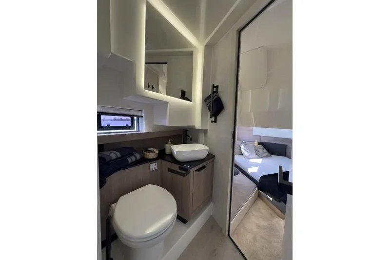 Slide: The Image of Modern bathroom interior of 2026 Cobra Yachts Campione 41 Coupe, featuring sleek design and luxury amenities. - 14