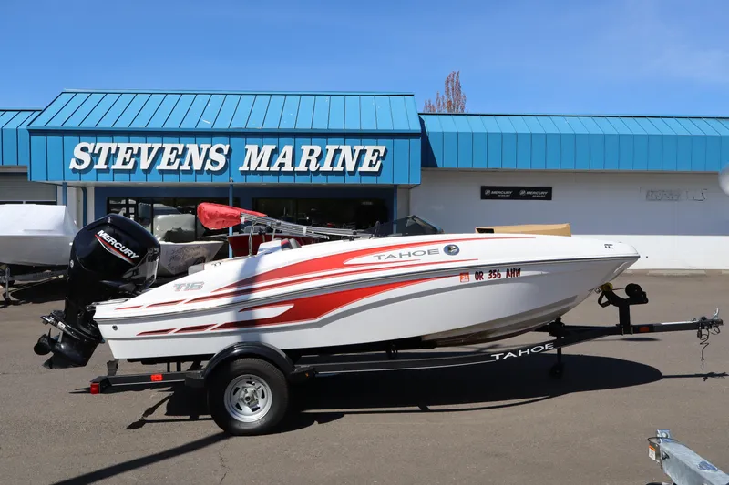 The Image of 2023 White River Tahoe boat at Stevens Marine dealership, featuring sleek design and Mercury engine. - 1