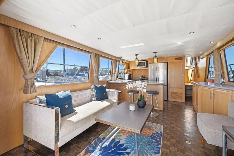 Slide: The Image of Luxurious interior of 1991 Ocean Alexander 520 Pilothouse yacht with modern furnishings. - 12